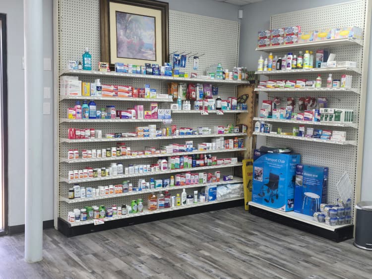 Pharmacist helping a patient.